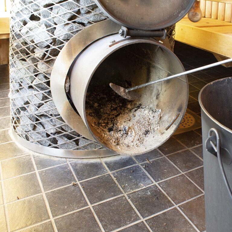 Pull the old cooed ashes down into the ash pan